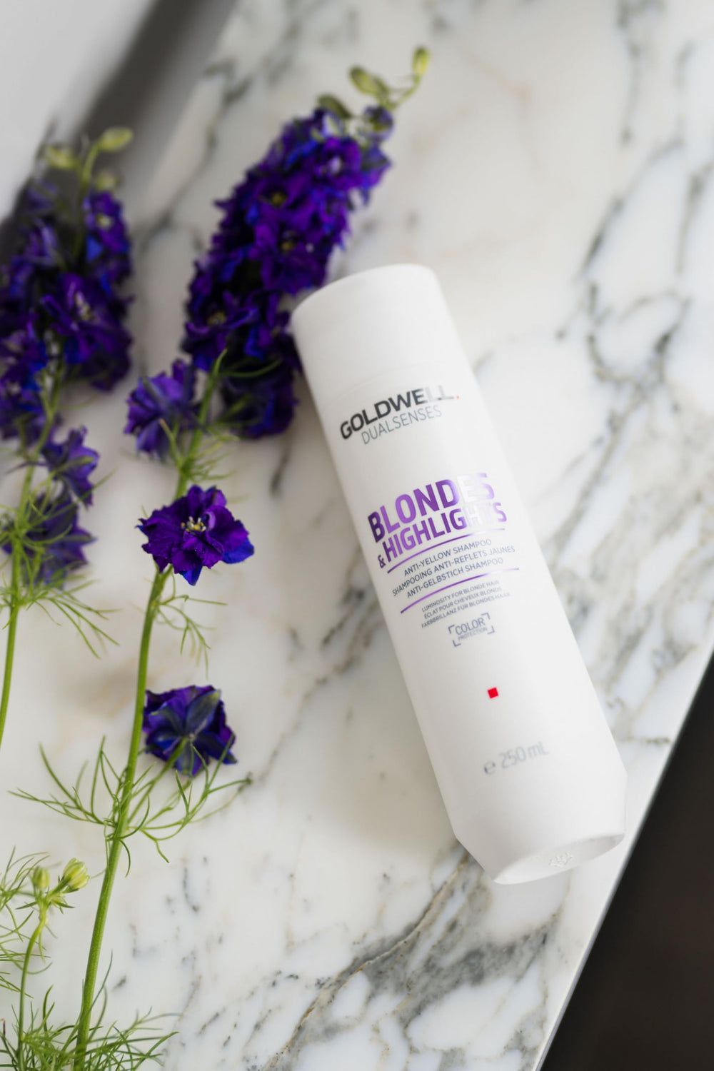 Goldwell FadeStop formula on sleek bottle promises color retention