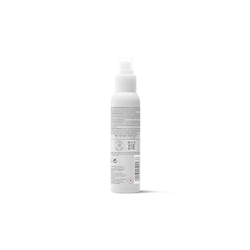 Goldwell StyleSign Smoothing Serum Spray fine mist demonstrates even distribution and frizz protection.