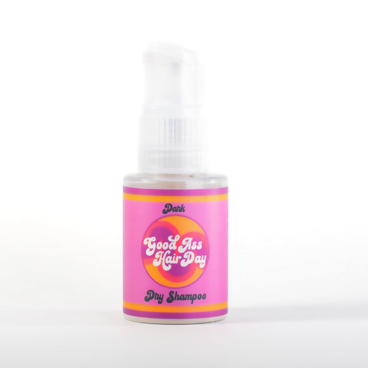 Good Ass Hair Day dark dry shampoo powder refreshes oily roots with no white cast.