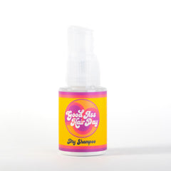 Good Ass Hair Day dry shampoo powder with vanilla scent refreshes oily roots in seconds.
