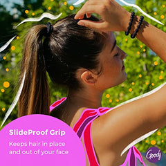 A person wearing Goody hair ties on the wrist for quick access during workouts.