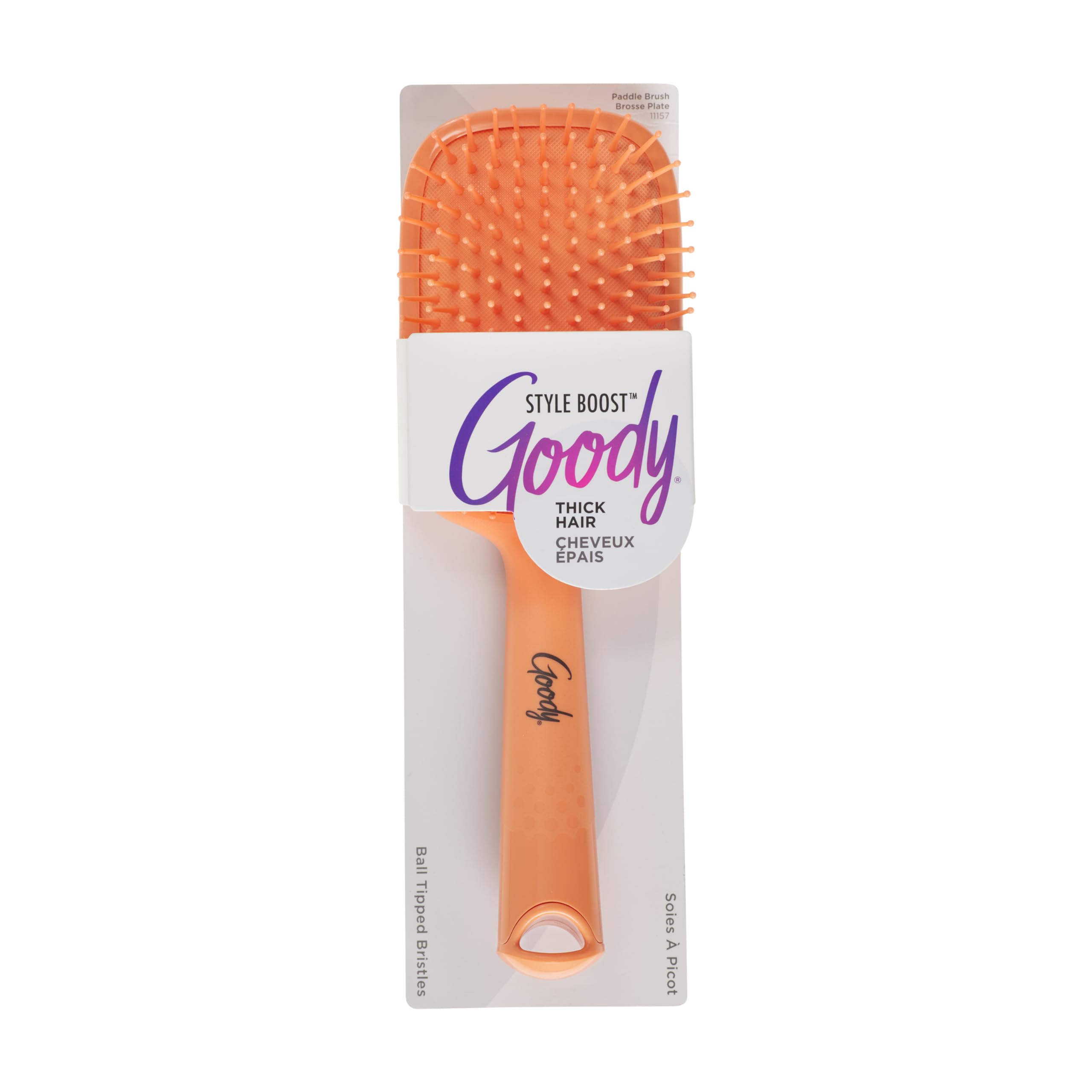 Goody Style Boost paddle brush in coral gently detangles knots with flexible bristles.
