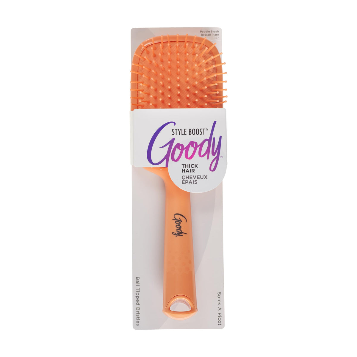Goody Style Boost paddle brush in coral gently detangles knots with flexible bristles.