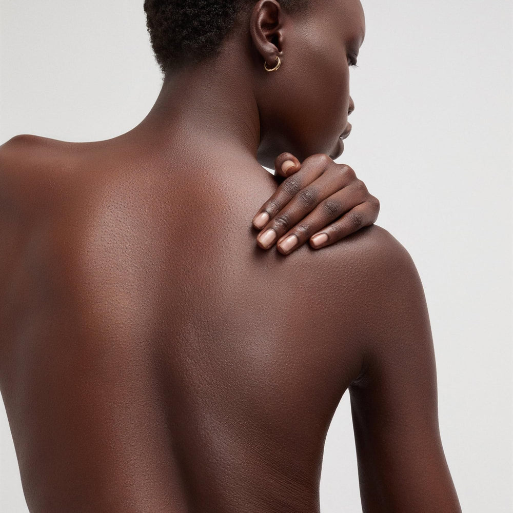 Goop Beauty Body Butter texture swirl demonstrates luxurious melt