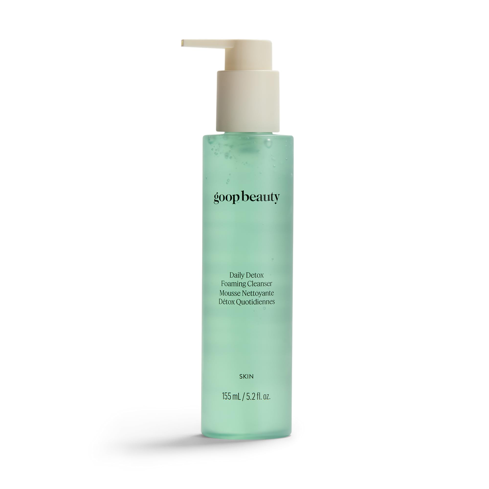 Goop Beauty Daily Detox Foaming Cleanser bottle pour, illustrating makeup removal and hydration