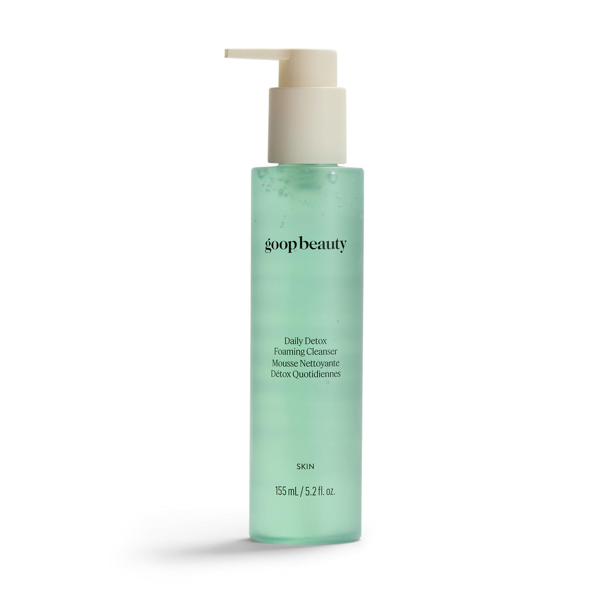 Goop Beauty Daily Detox Foaming Cleanser bottle pour, illustrating makeup removal and hydration