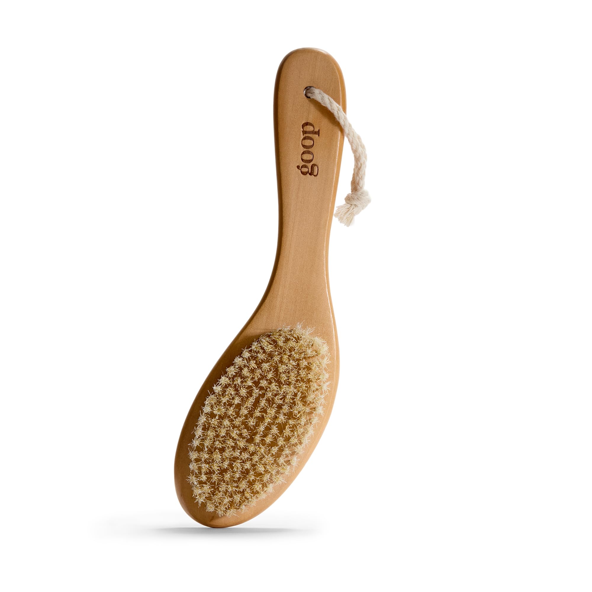 goop Beauty dry brush with wooden handle for gentle exfoliation and smoother skin