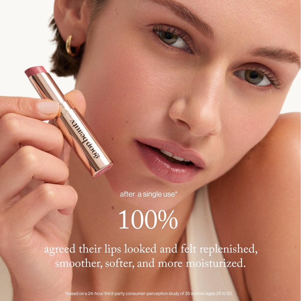 Goop Lip Balm tube close-up with sleek, travel-friendly packaging.