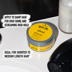 Vertical hairstyle created with Got2b Glued Spiking Hair Wax