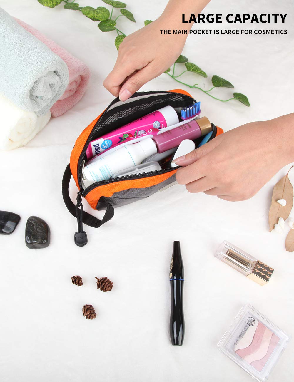 GOX bag open with multiple pockets highlights organized storage for bottles and small items.