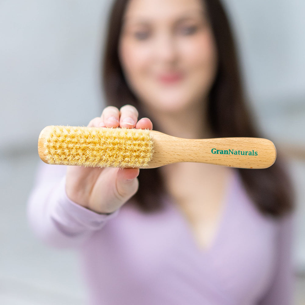 GranNaturals brush for all hair types image showing versatile styling.