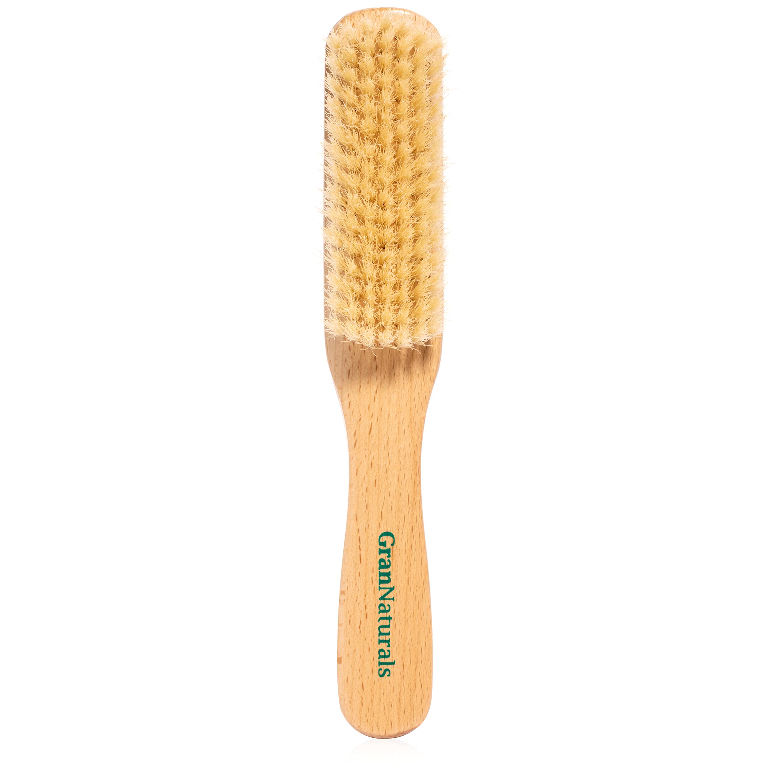 GranNaturals boar bristle brush close-up on soft white bristles for smooth styling.