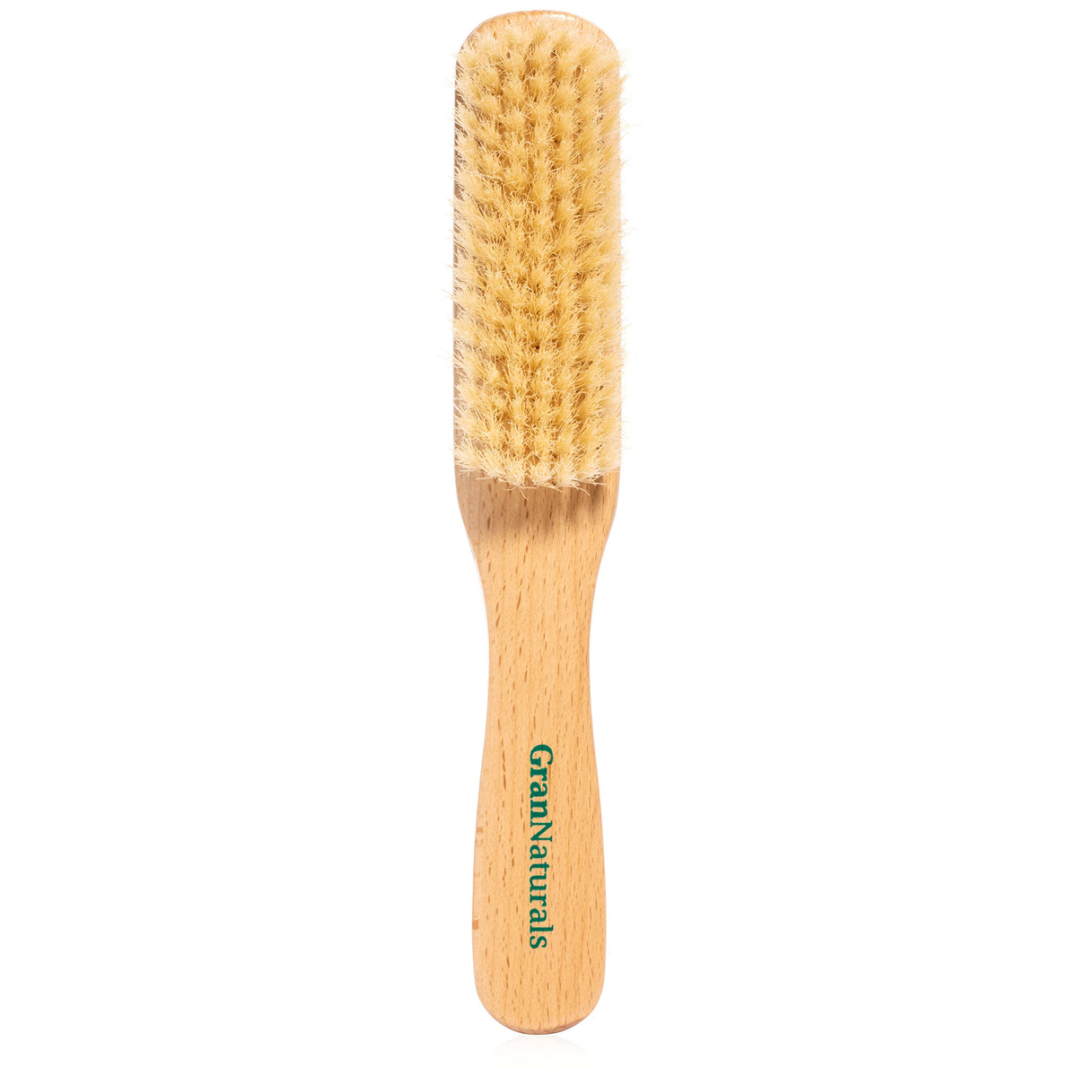 GranNaturals boar bristle brush close-up on soft white bristles for smooth styling.