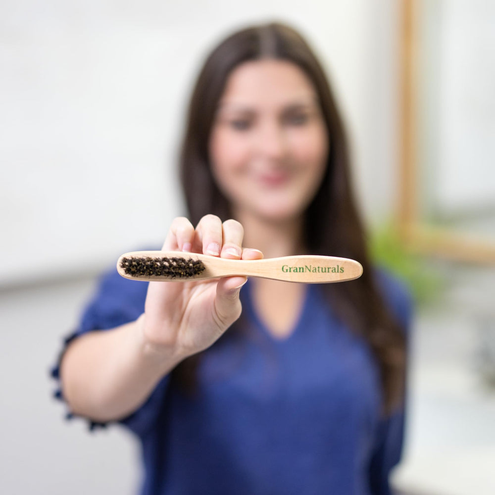 GranNaturals Portable Purse-Size Brush is ready for quick touch-ups anywhere.