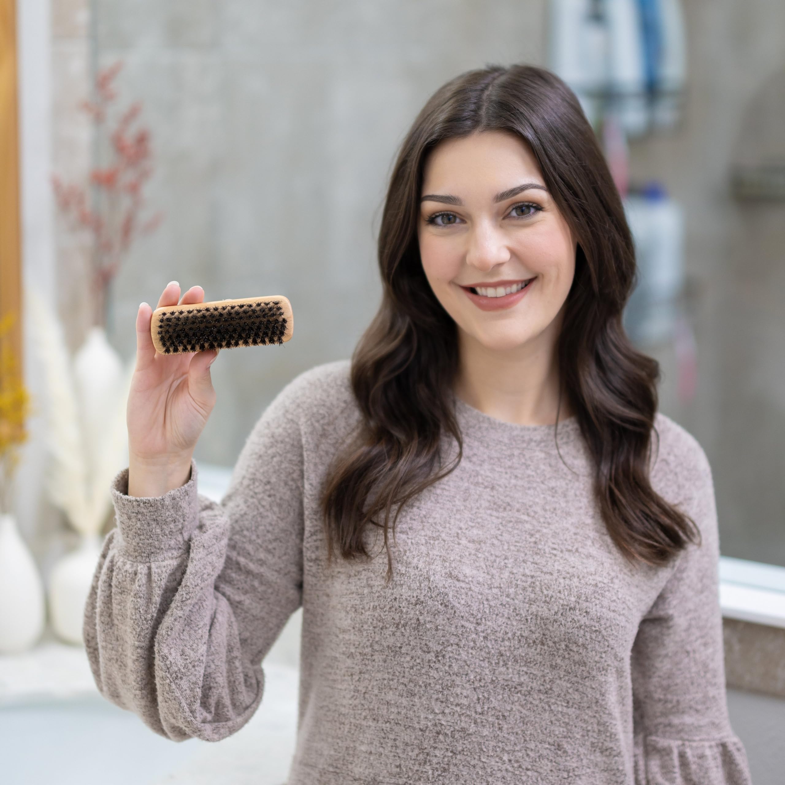GranNaturals wooden-handle hairbrush with ergonomic grip for precise styling control.