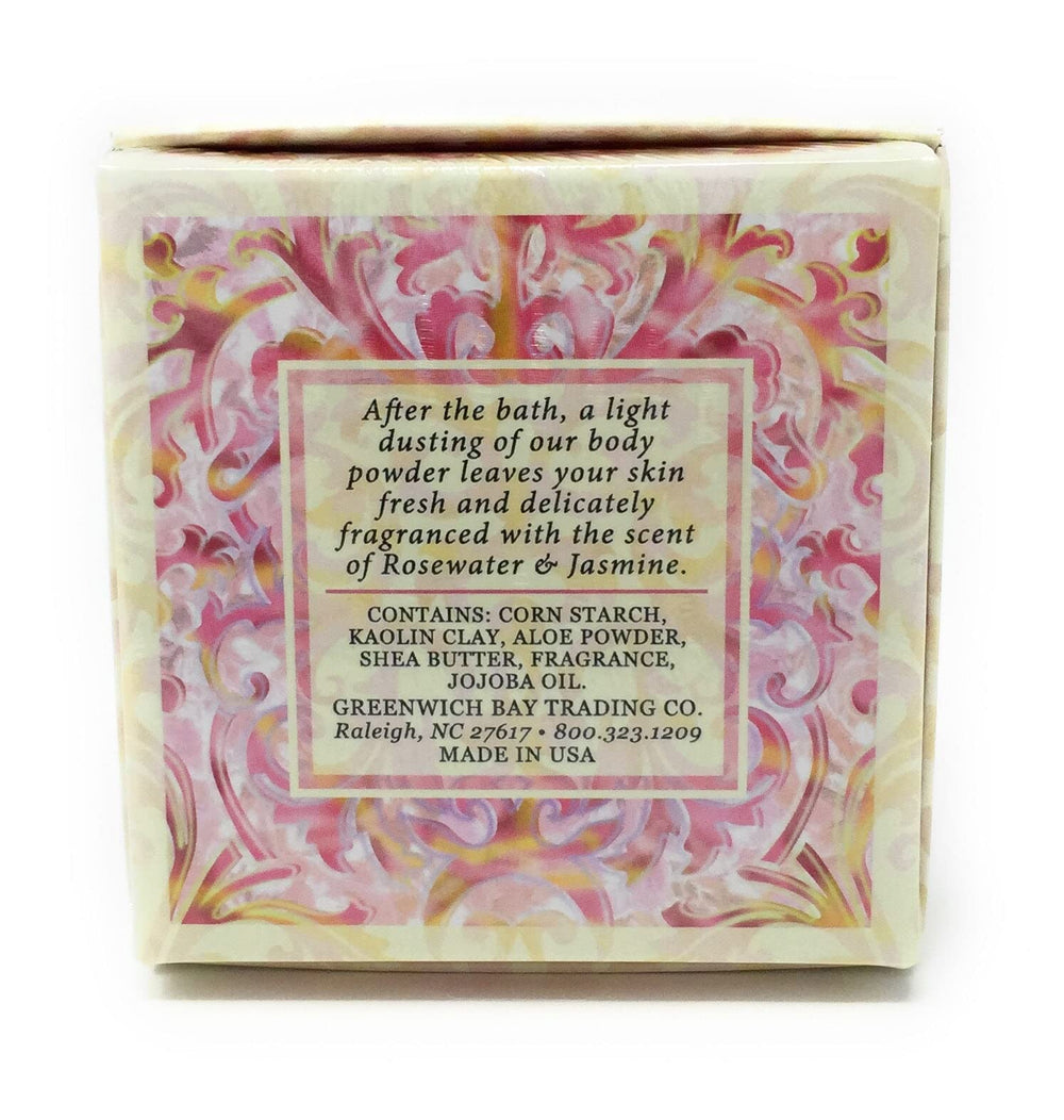 Applying Greenwich Bay Dusting Powder for soft, refreshed skin.
