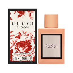 Gucci Bloom mini EDP bottle with elegant floral design for refined daily wear.