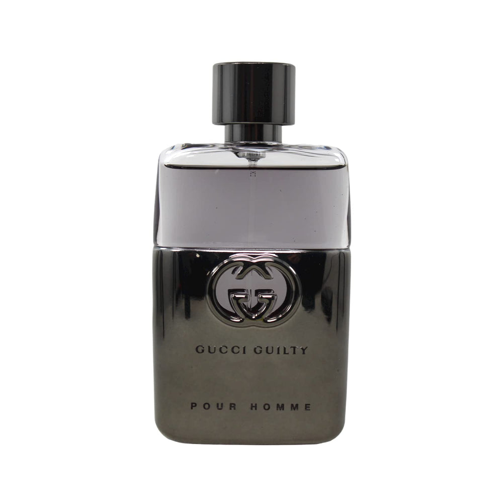 Gucci Guilty spray bottle, easy application for day-to-night confidence.