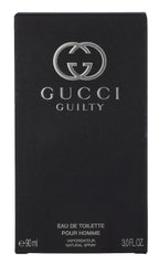 Gucci Guilty bottle detail highlights embossed logo and craftsmanship.