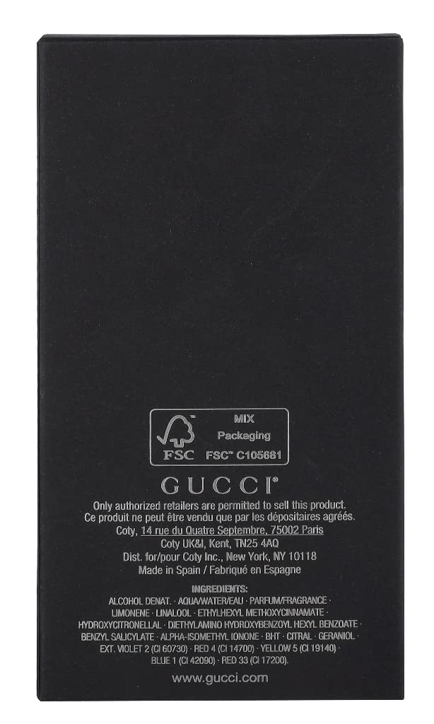 Gucci Guilty EDT spray in action angle for easy application.