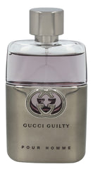 Close-up of Gucci Guilty Men bottle highlighting elegant glass and branding