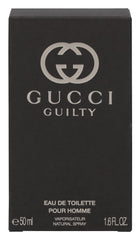 Cap detail of Gucci Guilty Men bottle emphasizing luxury finish
