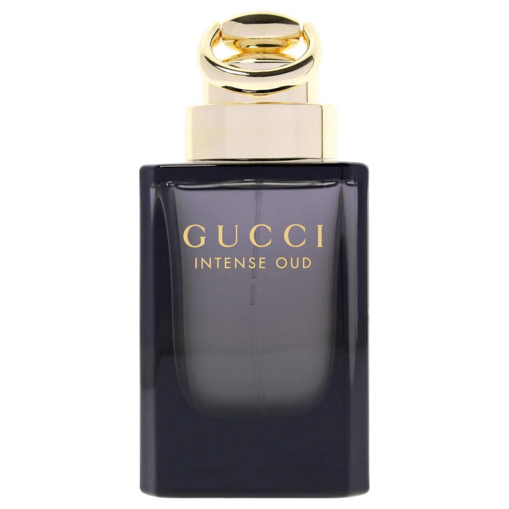 Gucci Intense Oud cap close-up showing premium details and branding.