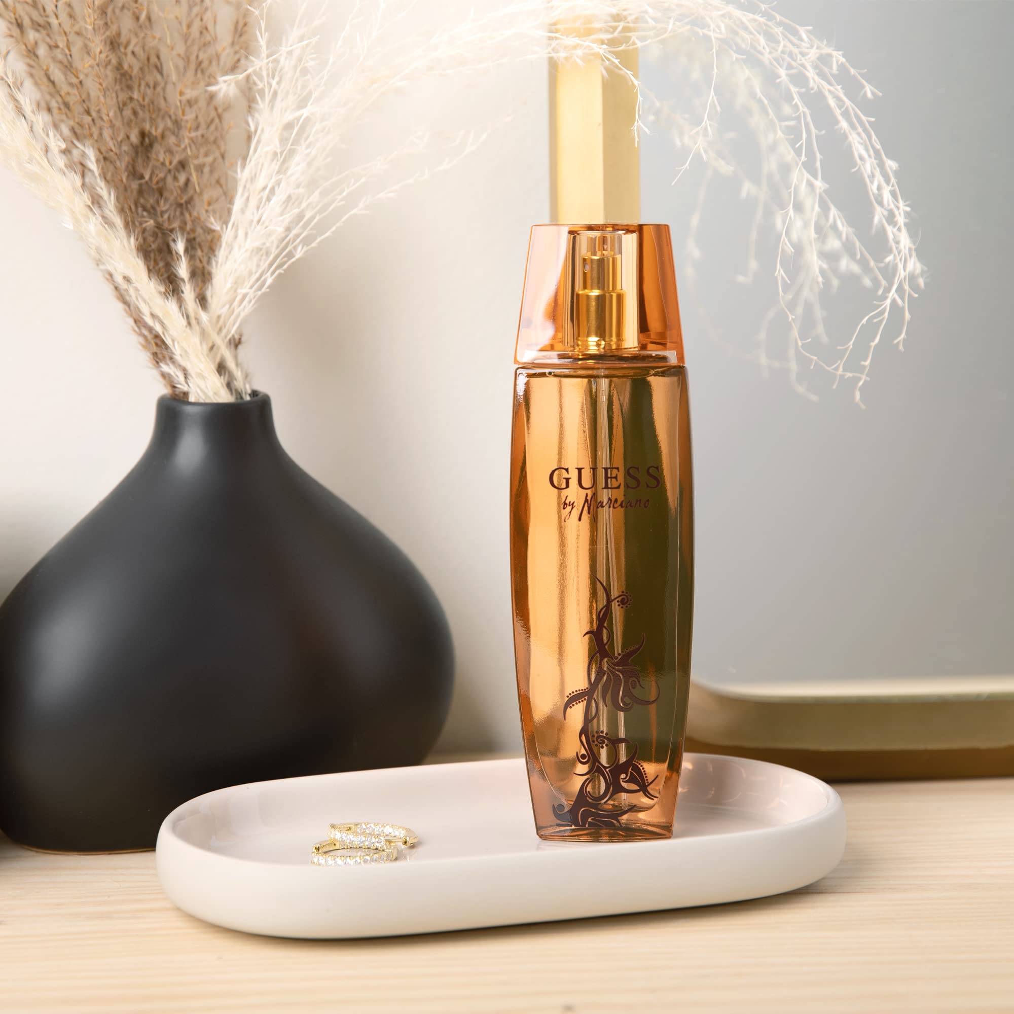 Guess Marciano spray bottle enables easy, even application