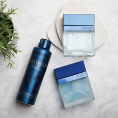 GUESS Seductive Homme Blue cap detail highlighting premium packaging and sleek style.