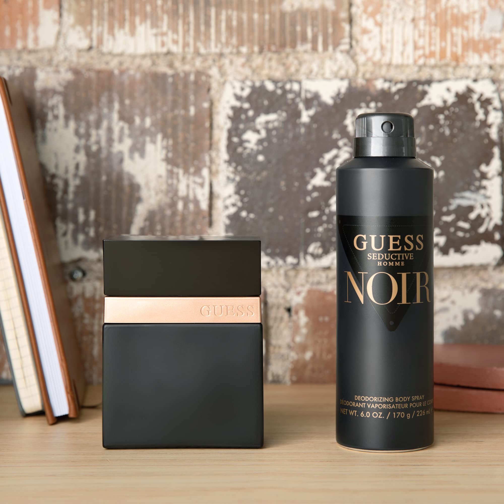 GUESS Seductive Homme Noir spray action showing easy application