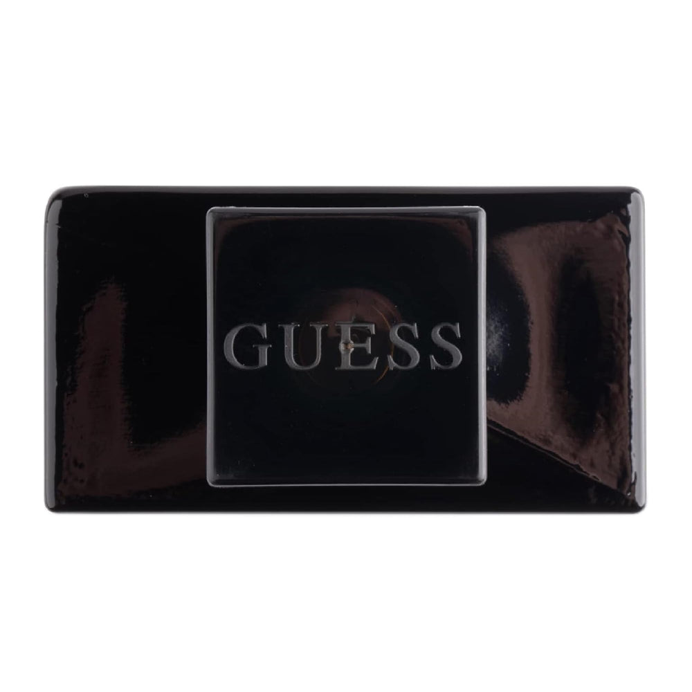 Close-up cap detail of GUESS Seductive Noir bottle with gold finish