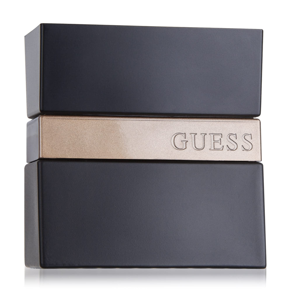 GUESS Seductive Noir spray mist captured mid-application moment