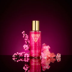Guess Sexy Skin Sweet Sugar fragrance mist bottle close-up highlighting fragrance notes and appeal