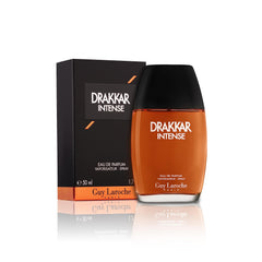 Guy Laroche Drakkar Intense bottle with amber glow for evening wear.
