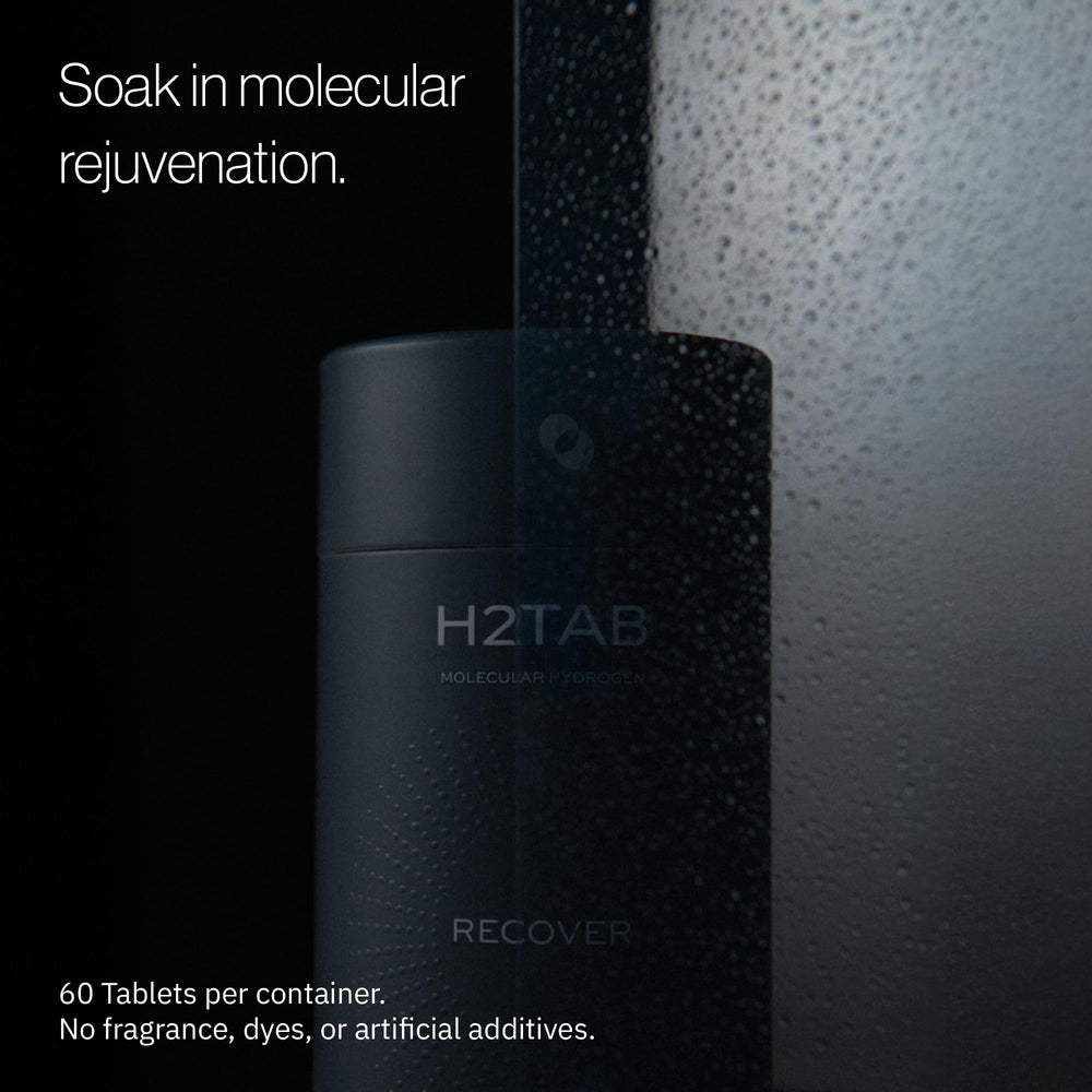H2TAB tablet dissolving in water releasing hydrogen for a soothing soak.