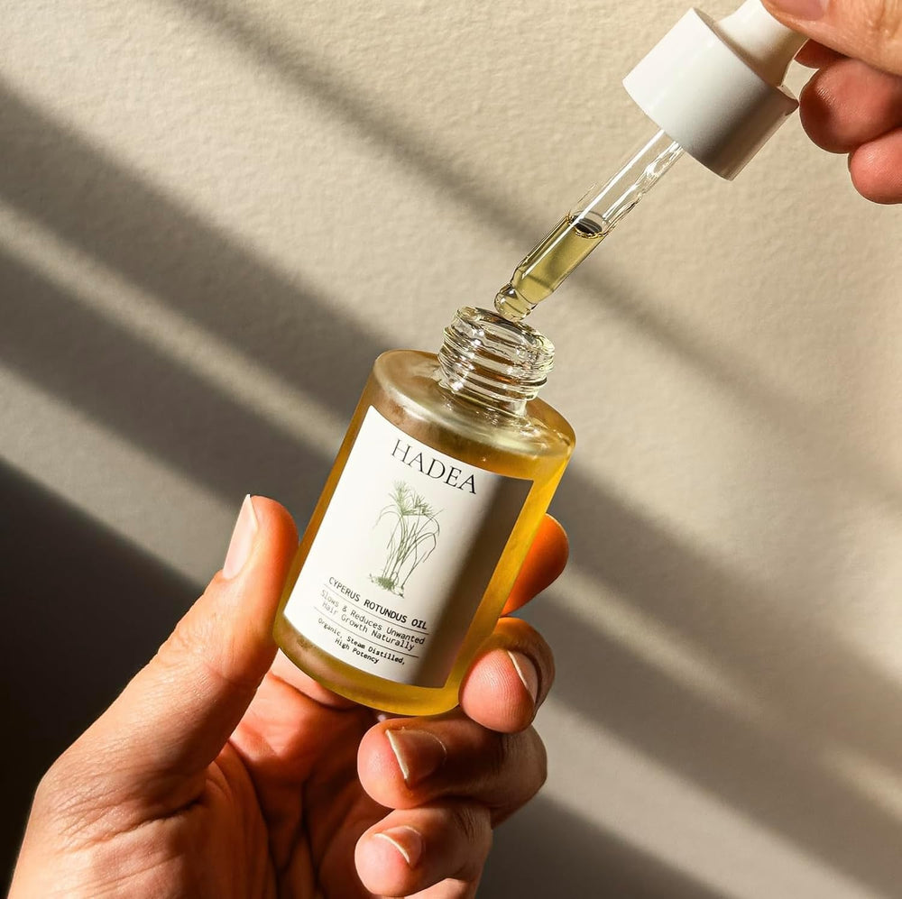 HADEA Cyperus Rotundus Oil steam-distilled process illustration suggests premium quality.