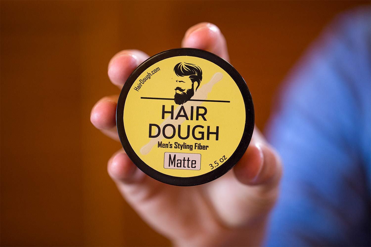 Hair Dough gym-use scenario showing sweat-resistant hold