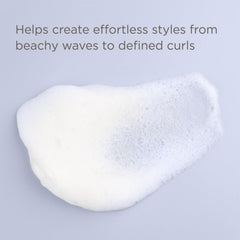 Hairitage Have It All mousse foam closeup highlights airy texture for smoother styling.