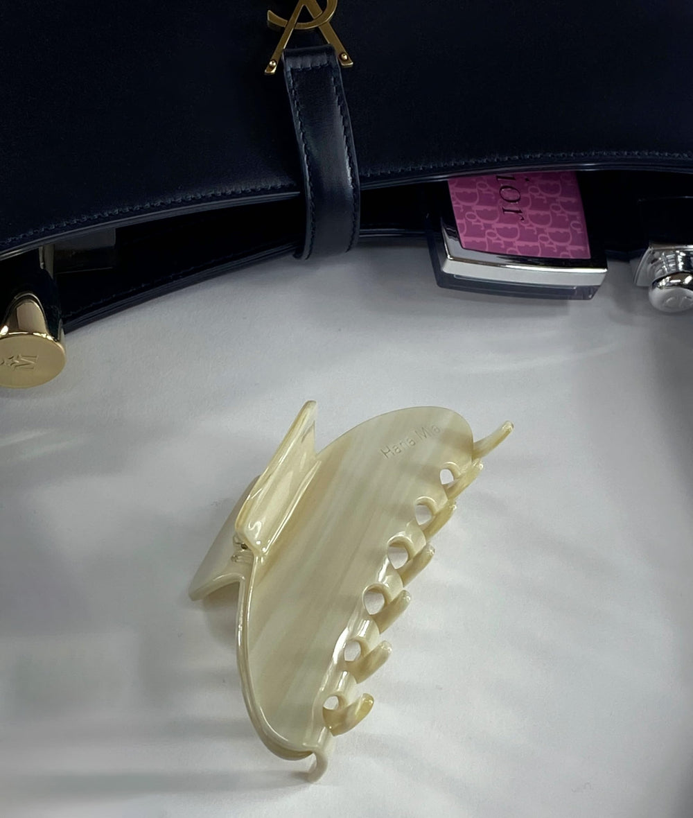 Hana Mia cream clip adds chic neutral touch to daily looks.
