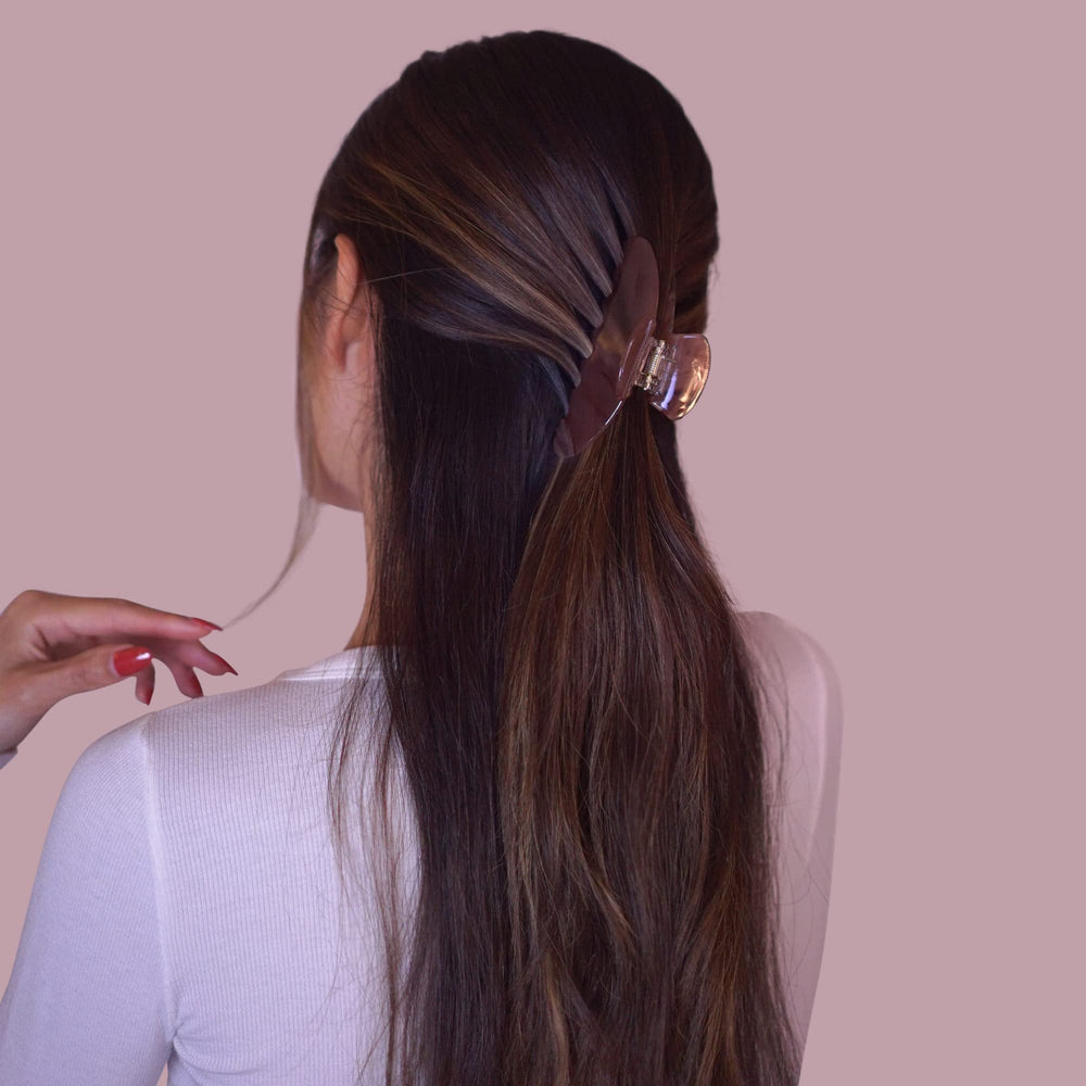 Hana Mia purse-friendly clip slips into bags for quick touch-ups.