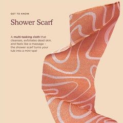 HANNI Shower Scarf in use on shoulder area for smooth skin.