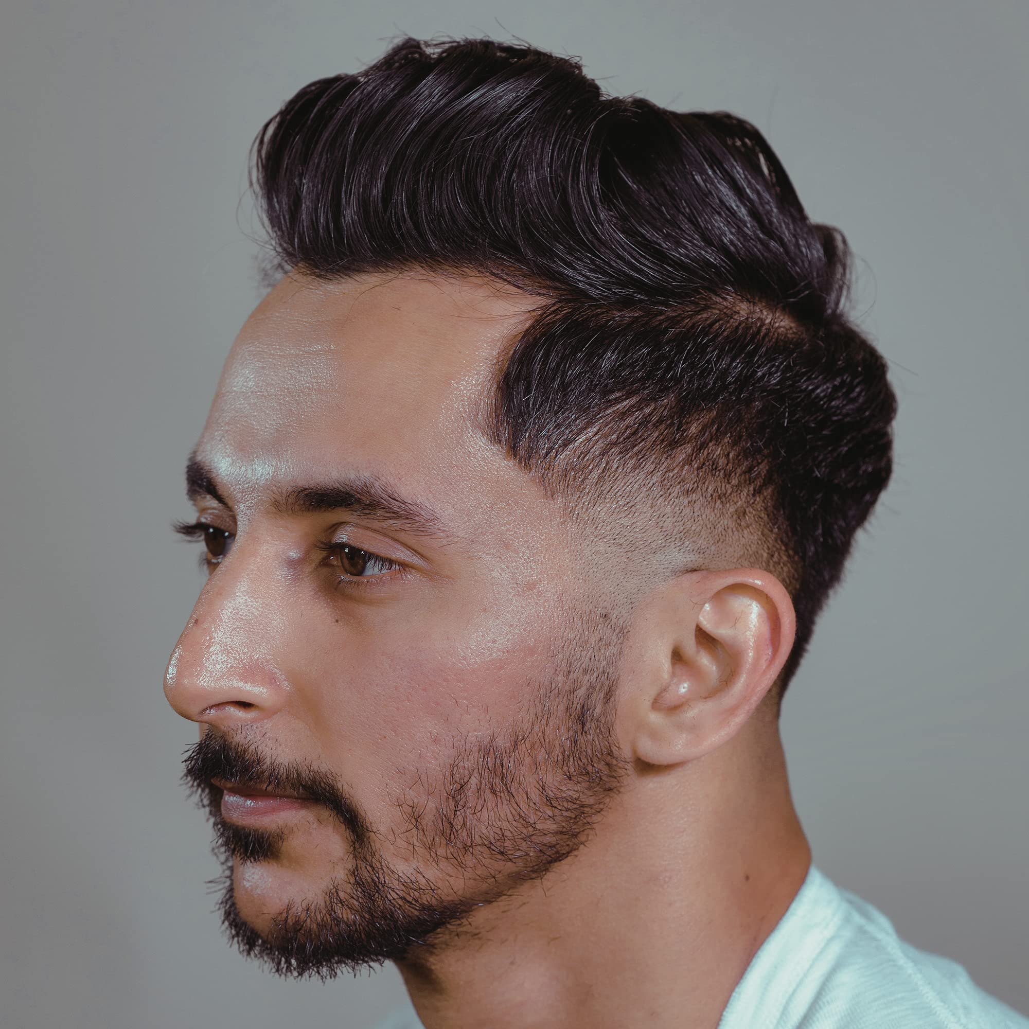 Damp-hair styling demonstrates high-hold texture with Gravity Paste