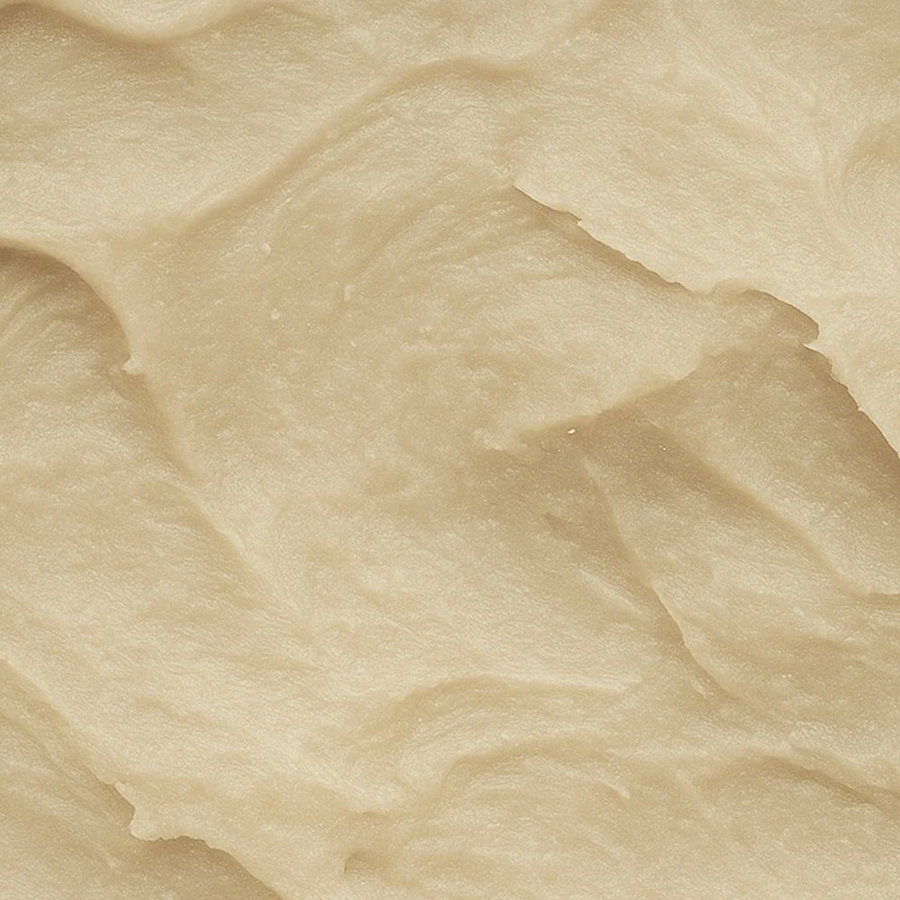 Texture close-up of Hardworking Gentlemen Hair Clay ready to spread
