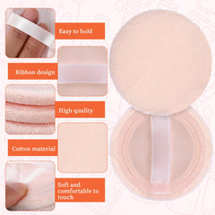Hariendny round velour face powder pad features a ribbon grip for control.