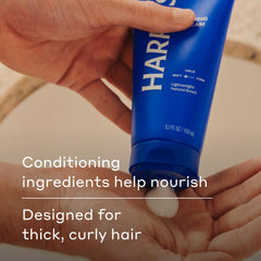 Harry's Hair Taming Cream applied by hands for effortless styling