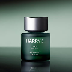 Harry's Kin bottle close-up label highlights premium packaging for gifting.