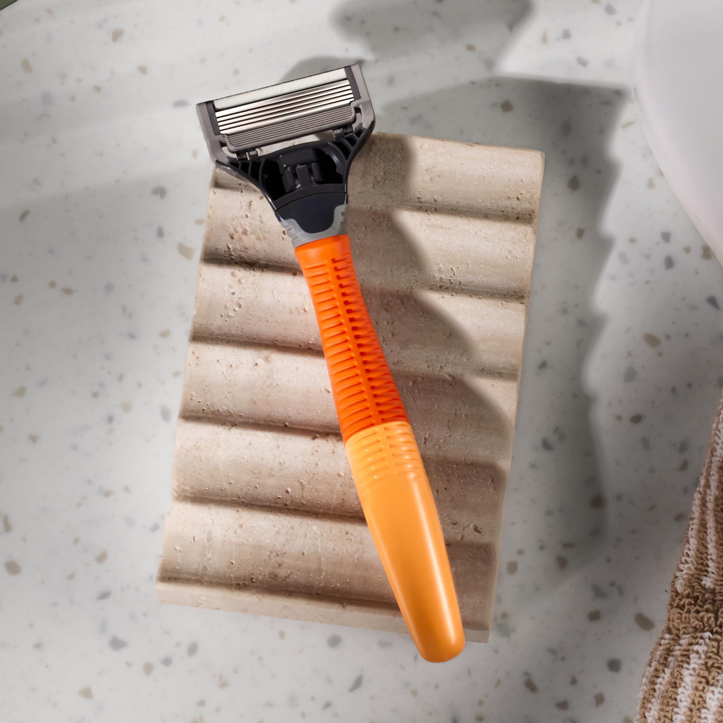 Harry's lubricating strip gliding along skin for comfortable shave
