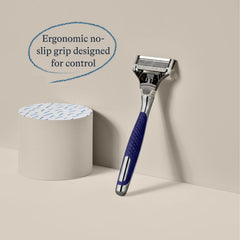 Harry's lubricating strip offers a smooth glide across facial curves.