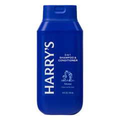 Close-up of Stone scent label shows charcoal and lime notes for bold daily grooming