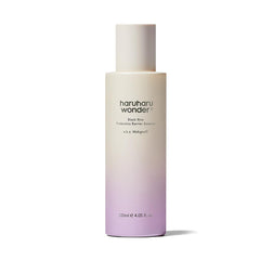 HARUHARU Wonder Black Rice Probiotics Essence bottle pour for easy application and hydration.